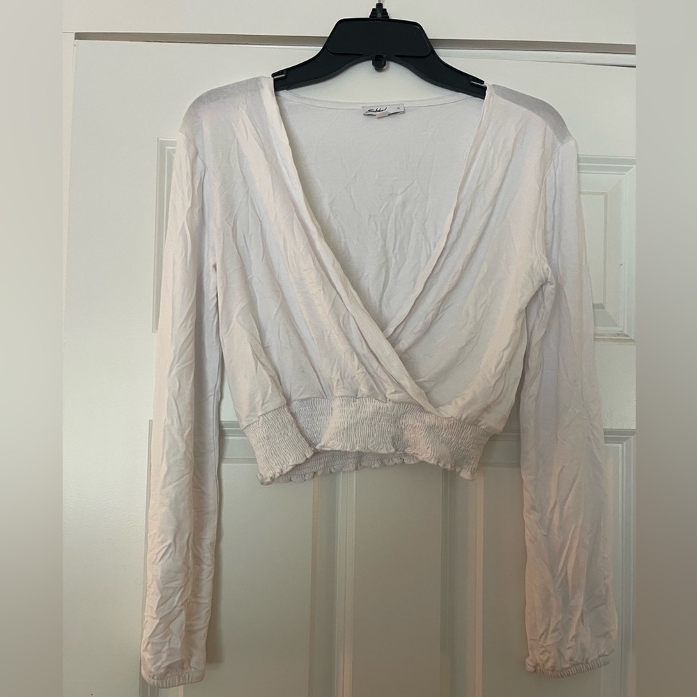 Subdued long sleeve V - neck